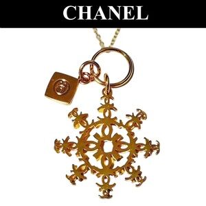 A-1DC-37: CHANEL Limited Edition Snowflake Charm Pendant on Golden Chain, NWOT